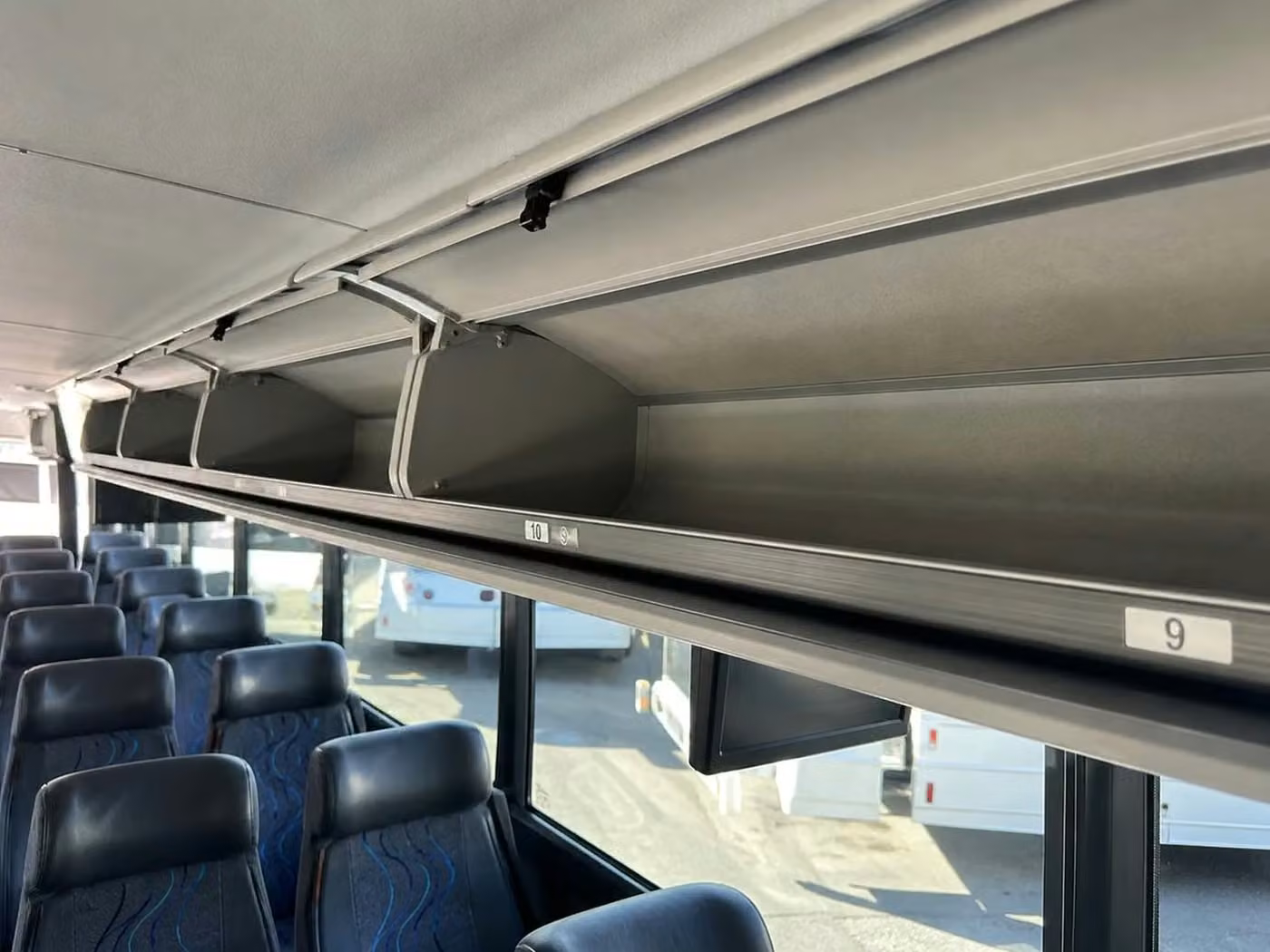 monterey charter bus overhead storage